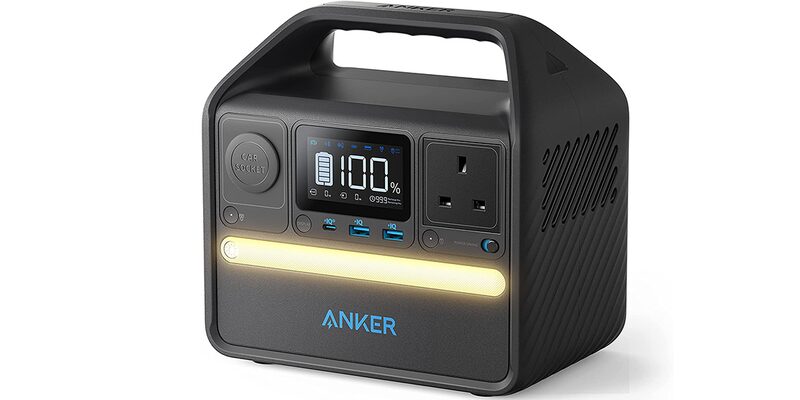 An Anker portable power station with a display showing 100%, USB ports, a UK socket and an LED light bar