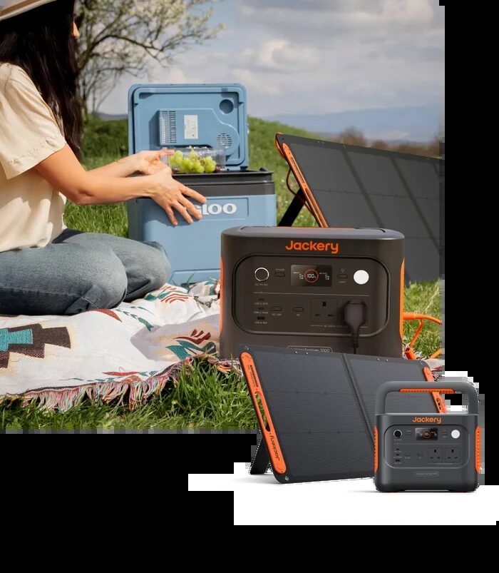 A Jackery portable power station with foldable solar panels set up at an outdoor picnic, with a composite product shot of the power station and solar panel in front