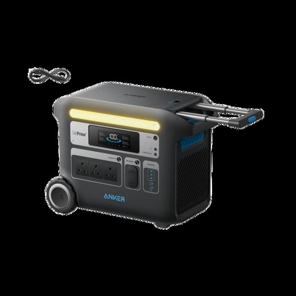 An Anker SOLIX F2000 portable power station with wheels, handle, display and UK sockets, with a charging cable beside it