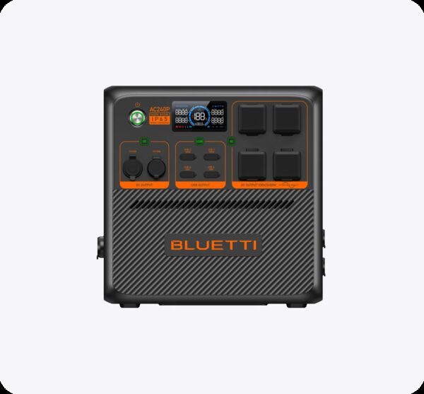 A BLUETTI AC240P portable power station with sockets, ports and display on a plain background