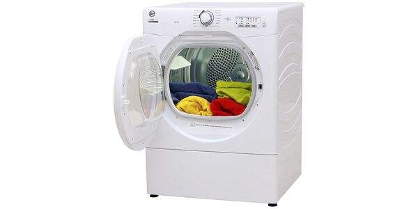 A white Hoover condenser tumble dryer with its door open, showing colourful laundry inside the drum