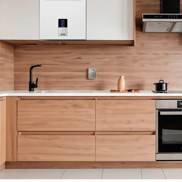 A white Ferroli wall-mounted condensing boiler installed in a modern wood-finished kitchen above the worktop