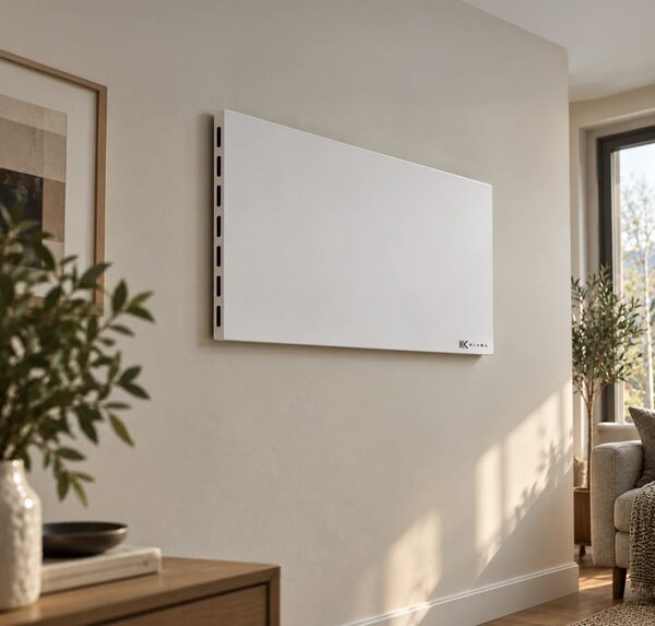 A white Kiasa infrared panel heater mounted on a living room wall