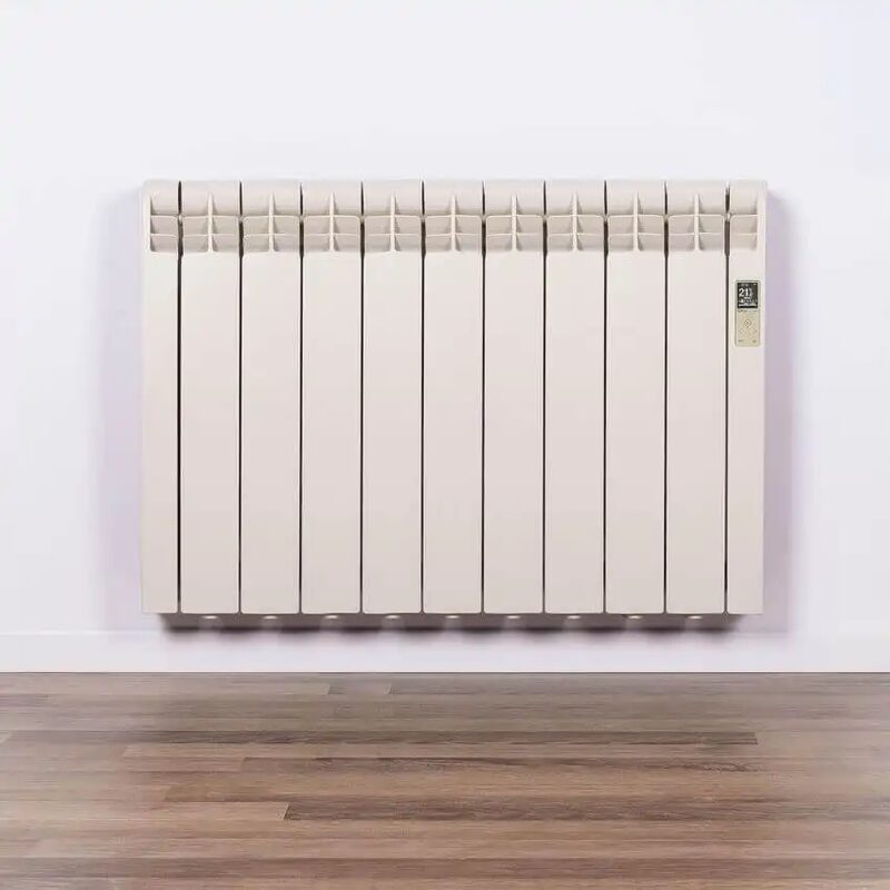 A white Rointe electric radiator mounted on a white wall above a wooden floor.