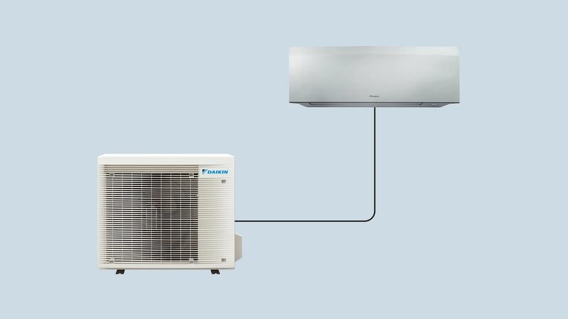 A Daikin split air conditioning system with an indoor wall unit and outdoor condenser unit connected by a line, on a plain blue background