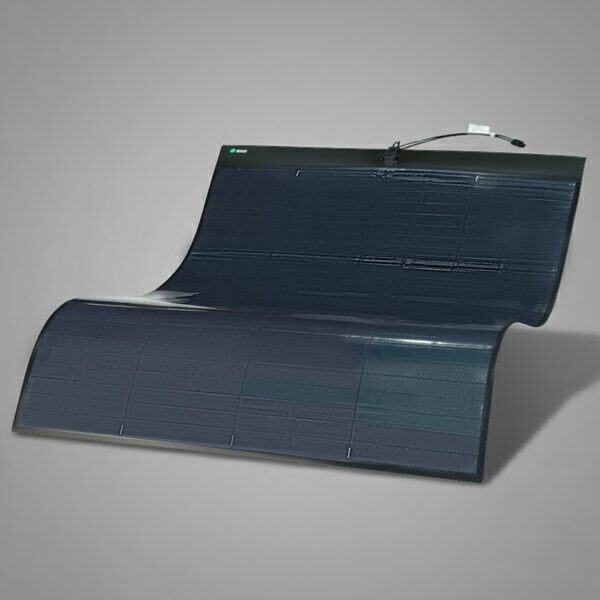 A flexible thin-film solar panel shown bent into a curve against a grey studio background