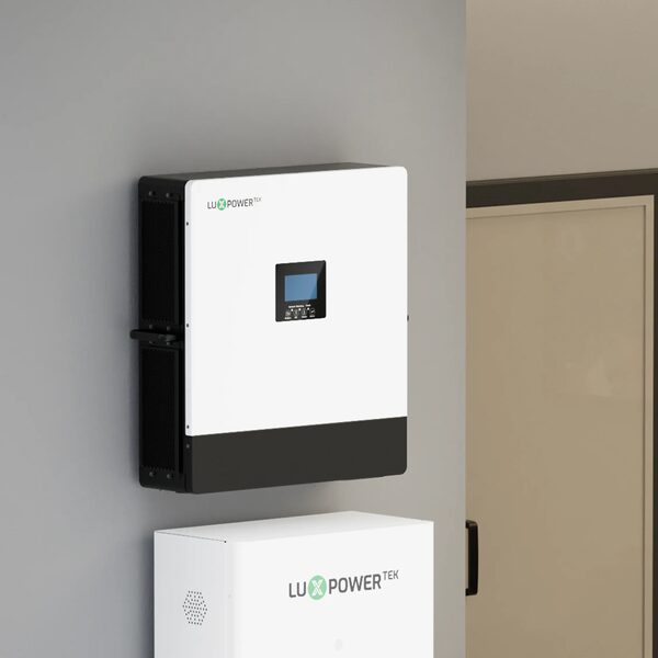 A LuxpowerTek wall-mounted off-grid inverter with a battery unit below, installed on an indoor wall