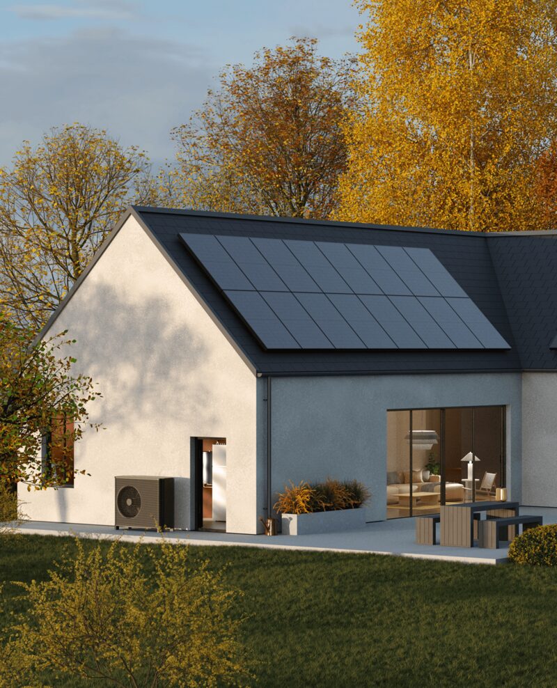 A modern white house with rooftop solar panels and an air source heat pump unit on the side wall