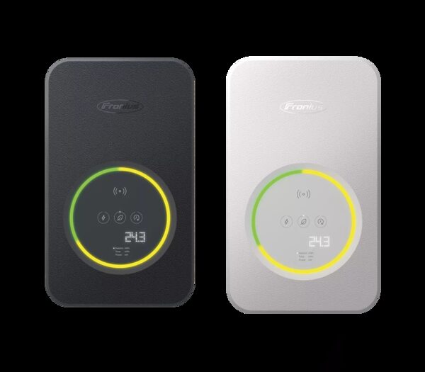 Two Fronius Wattpilot EV chargers, one black and one silver, shown against a white background