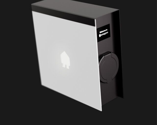 A Smappee EV wall charger, a white and black electric vehicle charging unit with a side socket and welcome display