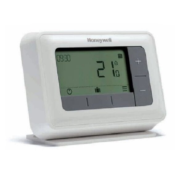 A Honeywell digital room thermostat with an LCD display showing the time and temperature