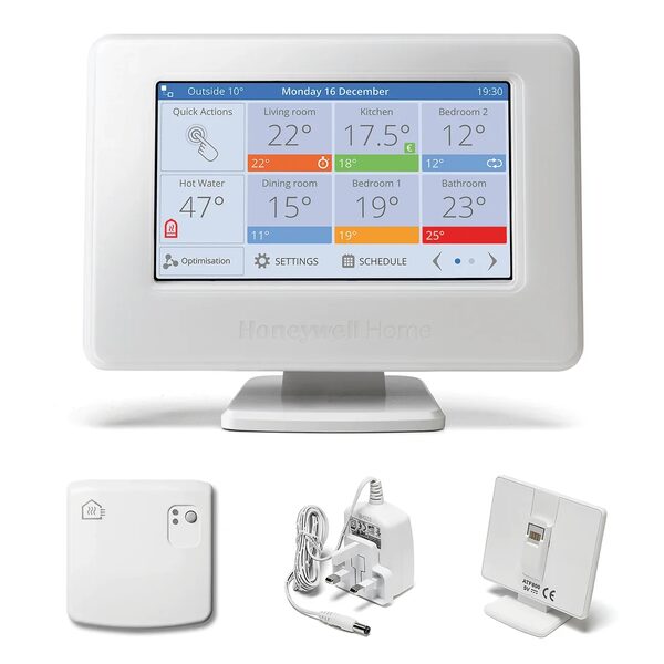 Honeywell Home Evohome connected thermostat with colour touchscreen showing room temperatures, plus its receiver box, mains plug and stand