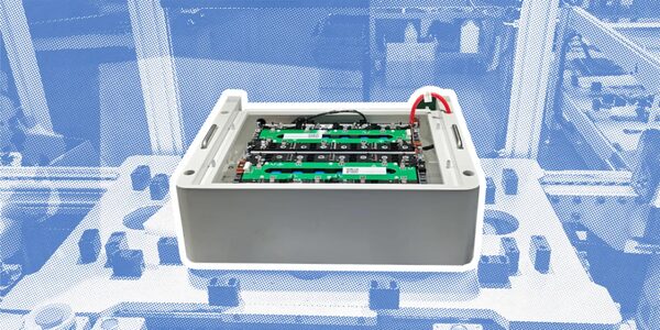 An opened home battery storage unit showing its internal battery cells and wiring, cut out over a blue-tinted factory background