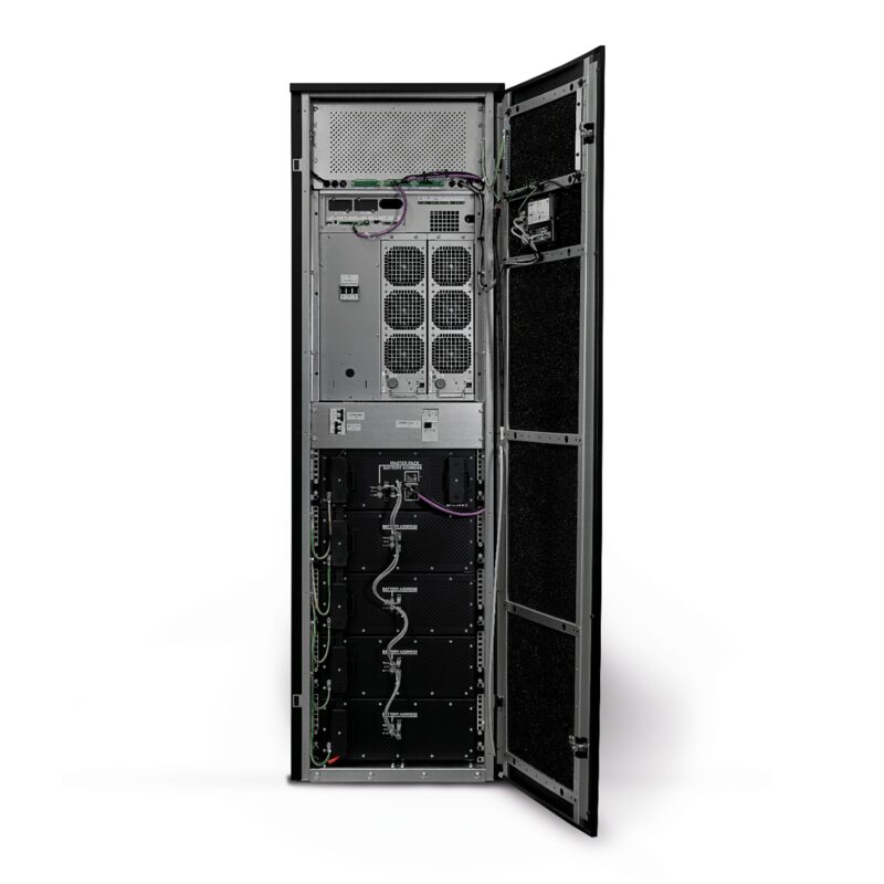 An open commercial battery storage cabinet (Eaton xStorage) showing internal power modules, fans and wiring