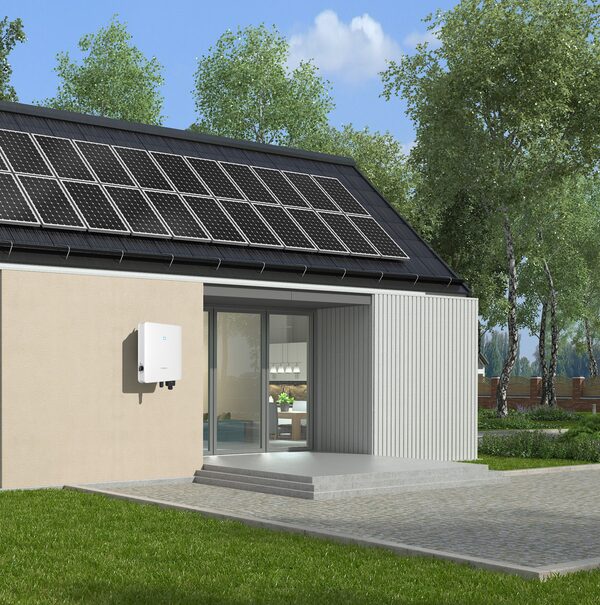 A modern house with rooftop solar panels and a white Sungrow battery/inverter unit mounted on the exterior wall