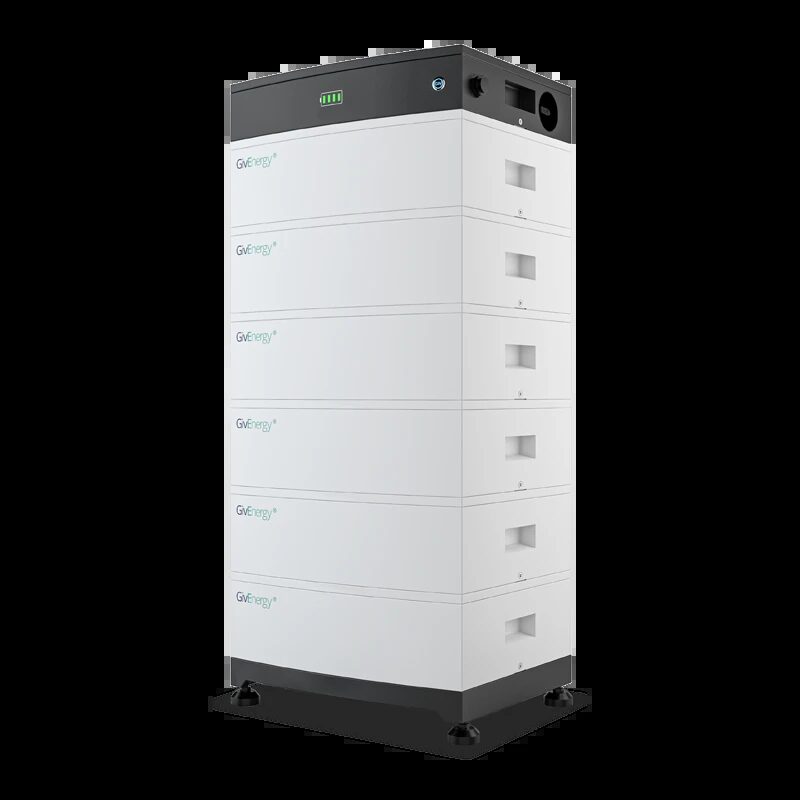 Two stacked Dyness home battery units on the floor of a utility room next to a wall-mounted inverter and grey electrical distribution cabinets