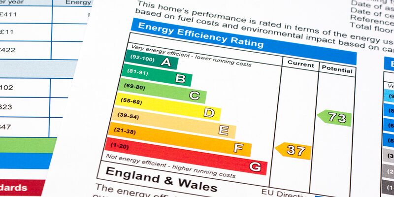A close-up of an Energy Performance Certificate chart showing the A-G energy efficiency rating scale with current rating 37 and potential 73