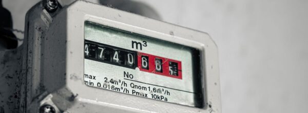 A close-up of a mechanical gas meter register displaying a reading in cubic metres