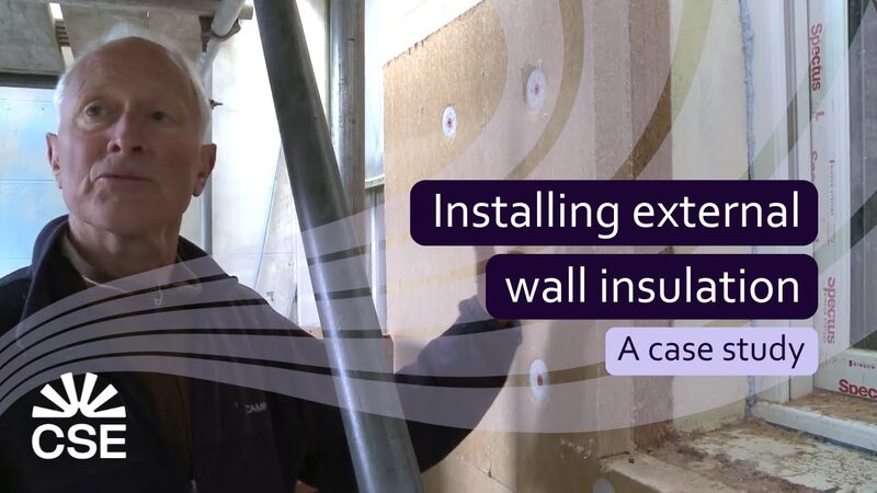 A video thumbnail for a Centre for Sustainable Energy case study showing a man beside scaffolding and a wall being fitted with external solid wall insulation boards