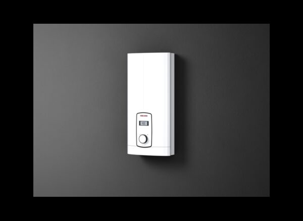 A white Stiebel Eltron DHB-E instantaneous electric water heater mounted on a dark grey wall