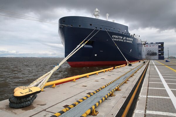 The LNG carrier ship Christophe de Margerie moored at a dock under an overcast sky