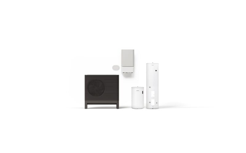 A heat pump outdoor unit shown alongside its indoor components including a hydrobox and hot water cylinders on a white background