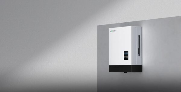 A white LuxpowerTek hybrid inverter unit mounted on a grey wall