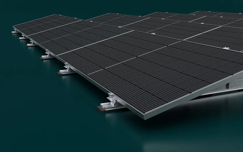 A 3D render of tilted solar panels mounted on a flat-roof ballasted mounting system