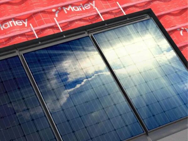 Marley solar roof tiles installed on a roof with red Marley branded underlay visible around them