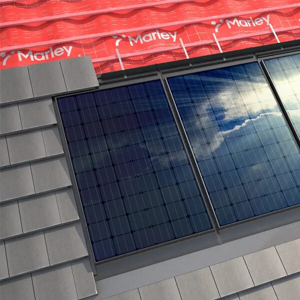 Roof-integrated Marley solar panels fitted flush among grey roof tiles with red Marley breather membrane visible above