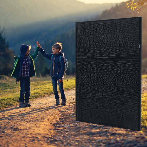 A REC Alpha Pure-RX all-black solar panel composited over a stock photo of two children high-fiving on a countryside path